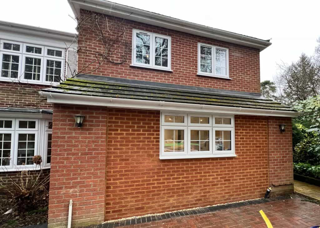 View of the front of a brick built house which has a completed garage conversion